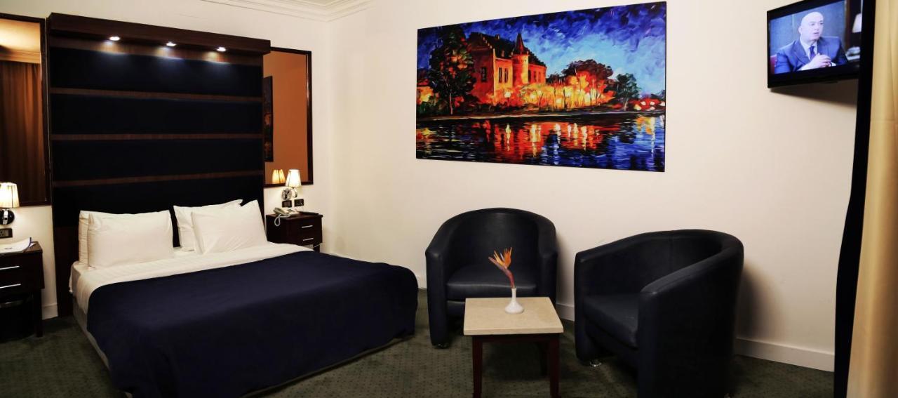 Spectra Inn Hotel 'Ezbet Sharikat Wardan ภายนอก รูปภาพ