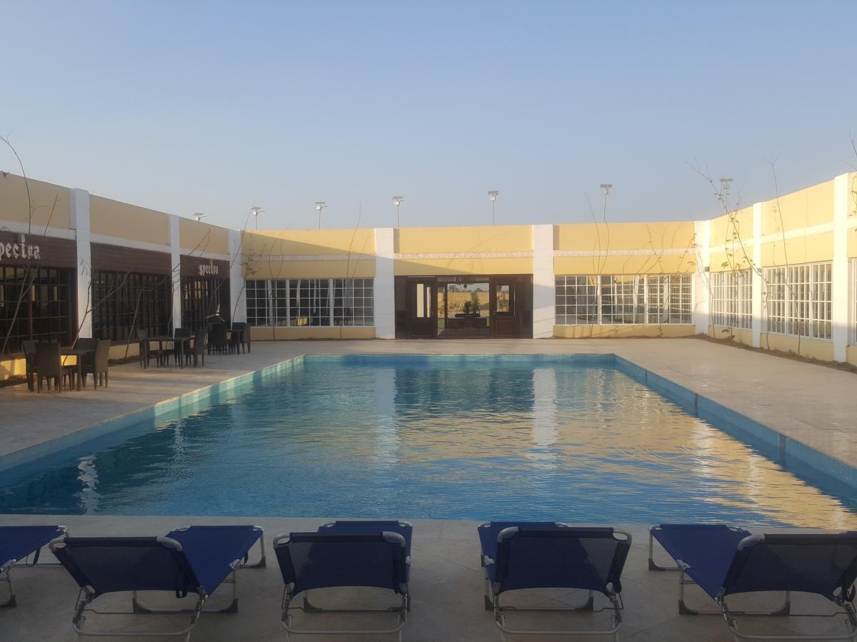 Spectra Inn Hotel 'Ezbet Sharikat Wardan ภายนอก รูปภาพ