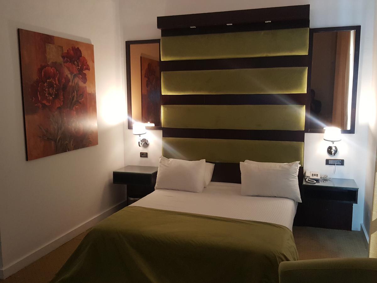 Spectra Inn Hotel 'Ezbet Sharikat Wardan ภายนอก รูปภาพ